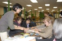 Group of women participate in a workshop exercise at SPURA Matters community visioning session