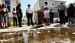 Officials toured a flooded street in Queens the day after the Hurricane Ida, where tenants were killed by floods in a basement apartment.

Michael Appleton/Mayoral Photography Office